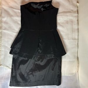 It’s a luxury dress. Cache’ size 6. Black
